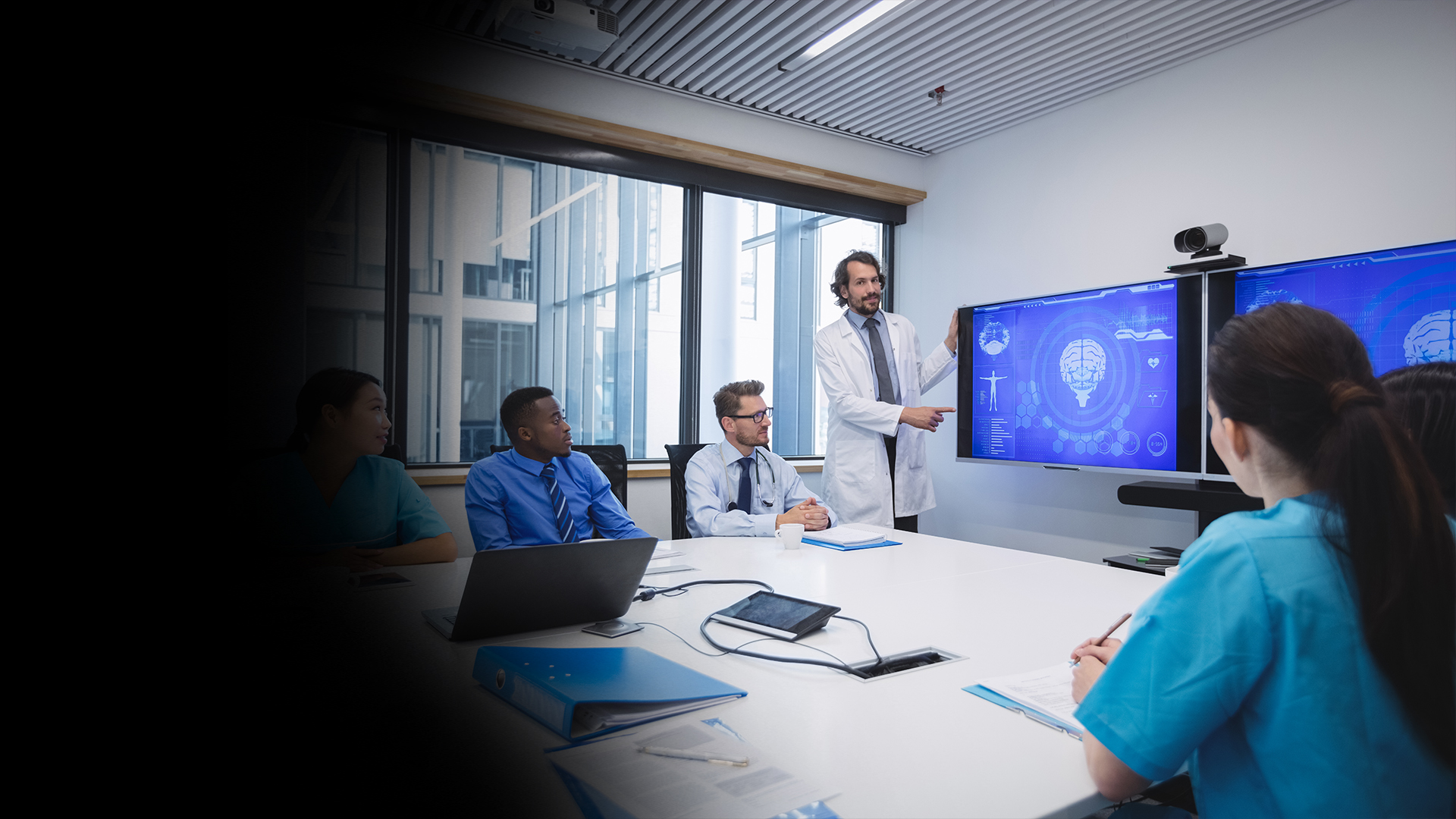 Healthcare professionals reviewing digital medical imaging during Azure infrastructure modernization.